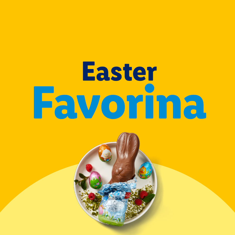 Easter chocolate bunny, eggs, and raspberries on a plate. Text: Easter Favorina.